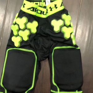 Football leg pads and chest cage and shoulder pads